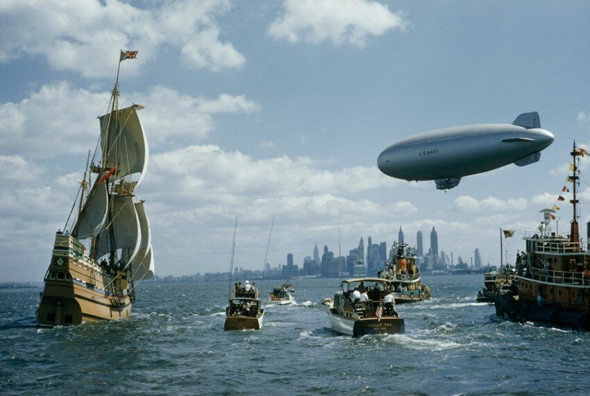 A replica of the Mayflower sails into New York Harbor with a welcoming fleet, November 1957